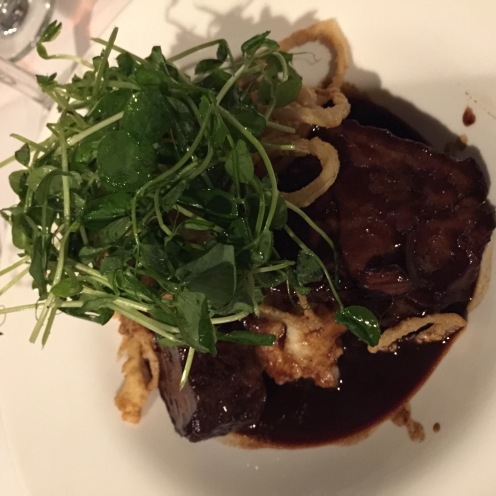 Allen Brothers Short: cauliflower puree, frizzled shallots, pea tendrils, Malbec & smoked black pepper sauce ($25)